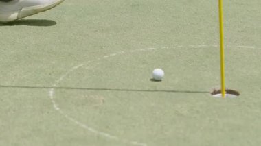 A golfer hits a golf ball with a golf club in Jakarta, Indonesia on September 13, 2025.