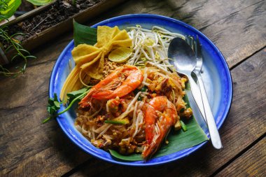 Tay ünlü yemeği Padthai. Pad Tay dili geleneksel tarzı Padthai en popüler kızarmış şehriye Tay Street besindir.