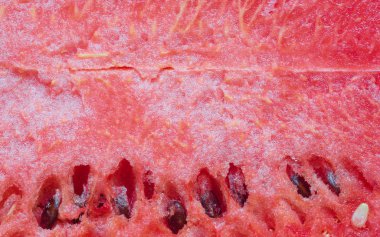 Kırmızı karpuz dokulu arka plan taze bir dilim closeup.