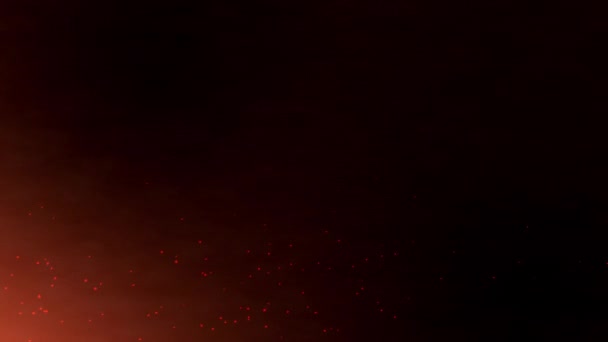 4K Огненный оранжевый светящийся прочь частицы на черном фоне. Горящие горячие искры, поднимающиеся из огня в ночном небе. Фон темы огня, света и жизни . — стоковое видео