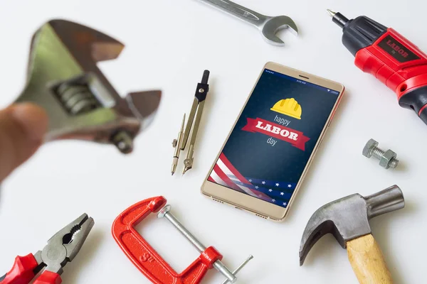 Happy labor day background concept. Flat lay mobile Phone With H