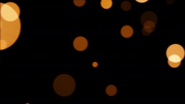 abstrait floue festive jaune orange lumières bokeh mouvement animation 3D. Concept de vacances toile de fond. Particules dorées claires défocalisées brune sur fond noir .