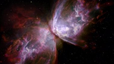 Bug Nebula ya da Kelebek Bulutsusu 'ndaki veya Caldwell 69' daki uzay sahalarında gezen kusursuz döngüler. Bilim, astronomi, nebula, uzay keşfi için 4k hareket döngüsü animasyonu.
