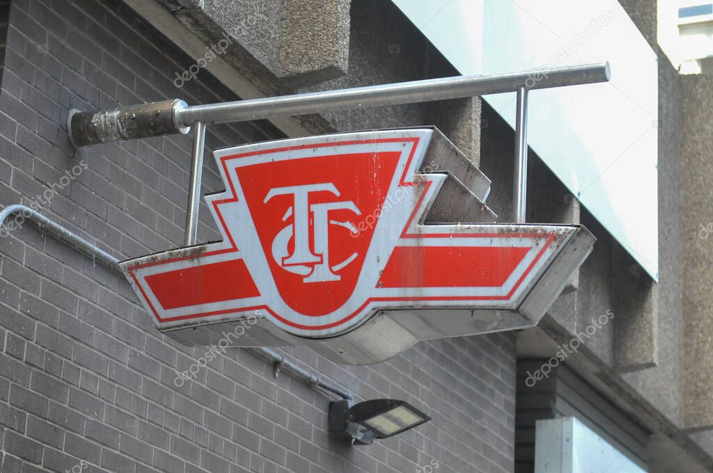 Toronto, ON, Canada  April 30, 2025: The sign of the Toronto Transit Commission transport company in Downtown Toronto..