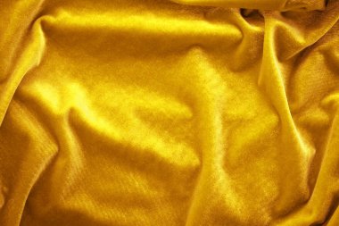 Altın ipek kadife yakın çekim. Doku ve arkaplan