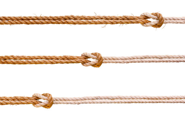 Three rough ropes with reef knot set. Isolated on white