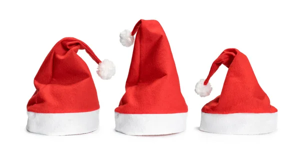 Red Christmas Hats Isolated White Side View — Stock Photo, Image