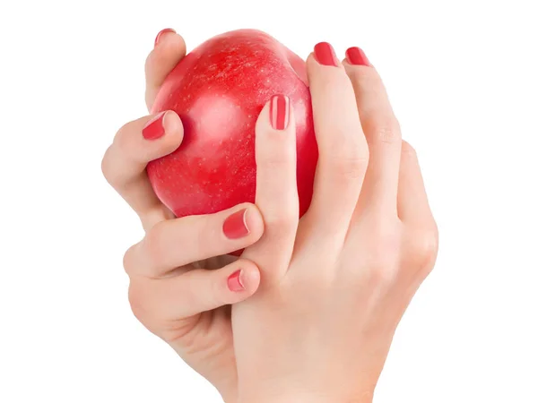Ręce Kobiety Czerwonymi Paznokciami Trzymające Czerwone Jabłko Izolacja Białym Ścieżka — Zdjęcie stockowe