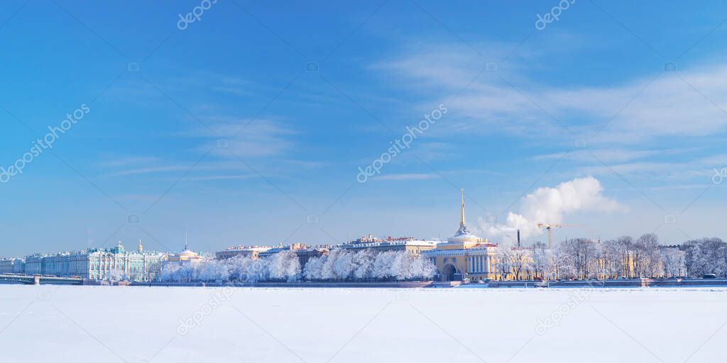 Winter panorama at Saint-Petersburg, Russia. Neva river and palace quay at sunny day