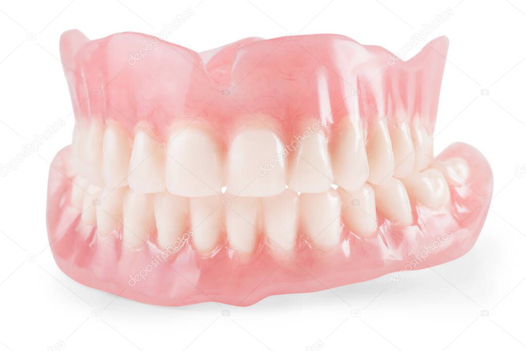 False teeth close up. Isolated on white, clipping path include
