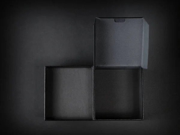 Open Black Cardboard Box Top View Black Background Low Key — Stock Photo, Image