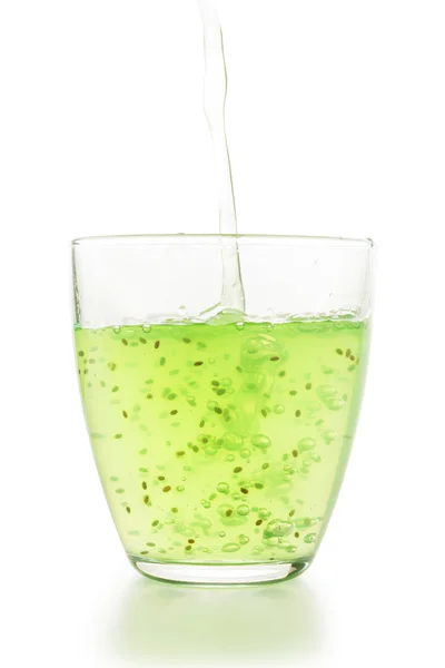 Gelatina Verde Con Semi Chia Versati Nel Bicchiere Isolato Bianco — Foto Stock