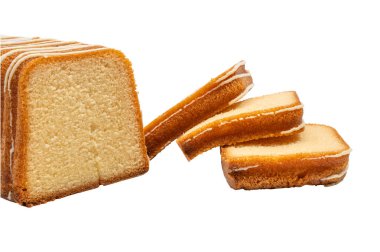 Cake loaf with slices, front view. Front view of sponge loaf cake with white icing and slices leaning forward, isolated on a white background. Golden crust with fluffy inside.