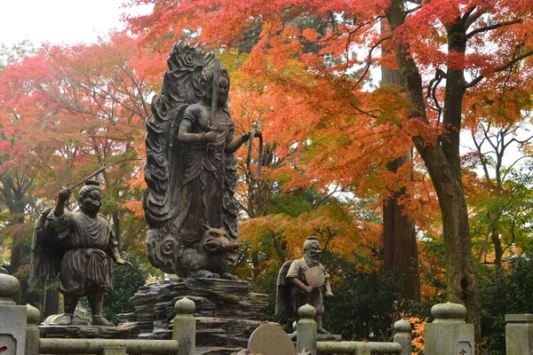 Asian warriors sculptures in autumn park