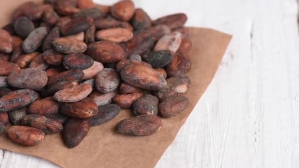 Delicious Aromatic Brown Roasted Cocoa Beans White Wooden Table — Stock Video