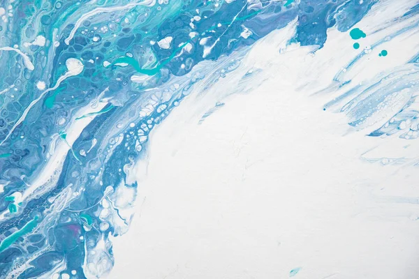 Beautiful background of liquid acrylic in blue, green and white