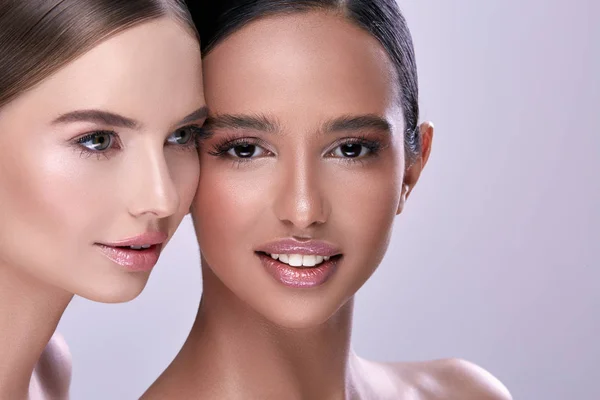 Portrait Young Beautiful Women Nude Makeup Posing Purple Backdrop Stock Photo by ©VelesStudio