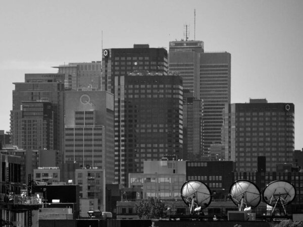 MONTREAL CANADA - 05 20 2020: Downtown Montreal is the central business district of Montreal, Quebec, Canada.