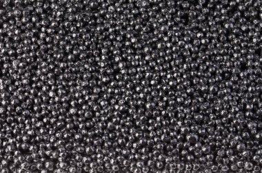 Black caviar close-up as a background. clipart