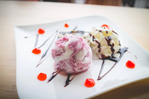 Chocolate brownies. Blueberry ice cream with brownies. Homemade