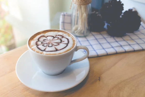 hot coffee with foam milk art. Black cup of coffee. Hot coffee i