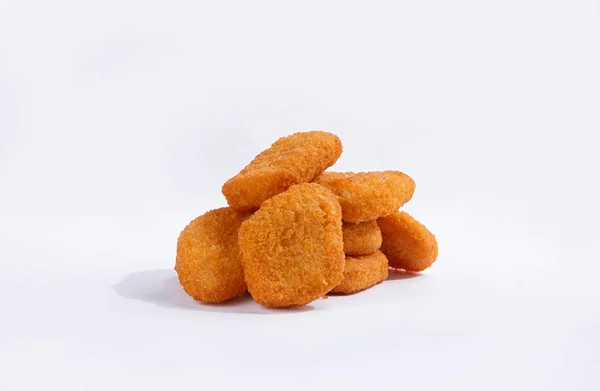 Nuggets em fundo branco — Fotografia de Stock