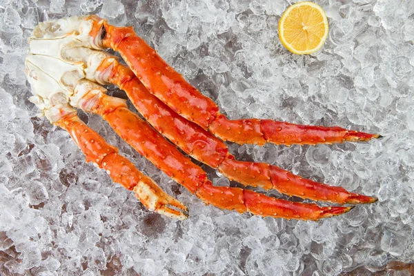 crab legs on ice