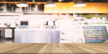 Ahşap masa ve bulanık Cafe