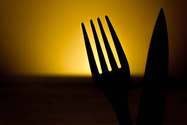 Cutlery Silhouette Made Fork Knife Dark Background Top Wooden Table — Stock Photo, Image