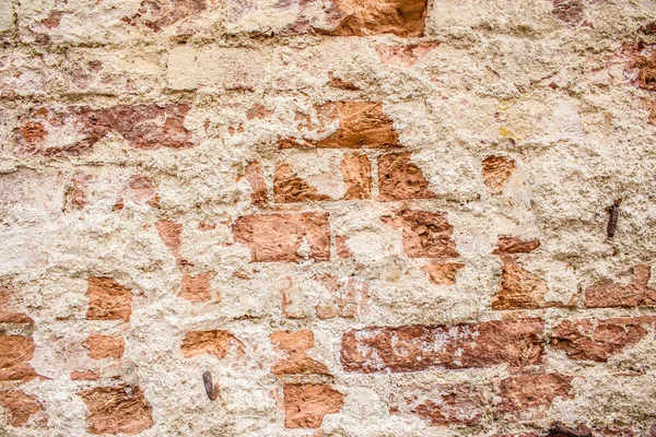 Close Schot Aan Een Gecorrodeerde Oranje Muur Textuur Met Bakstenen — Stockfoto