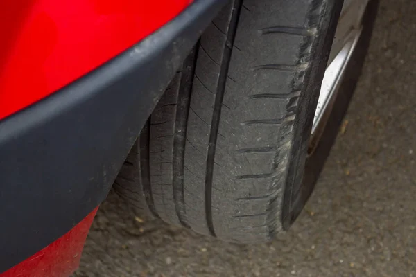 Closeup Red Car Tyre Road — Stock Photo, Image