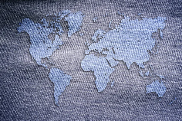 Mapa Del Mundo Sobre Fondo Jeans Banner Concepto Viaje Volante —  Fotos de Stock