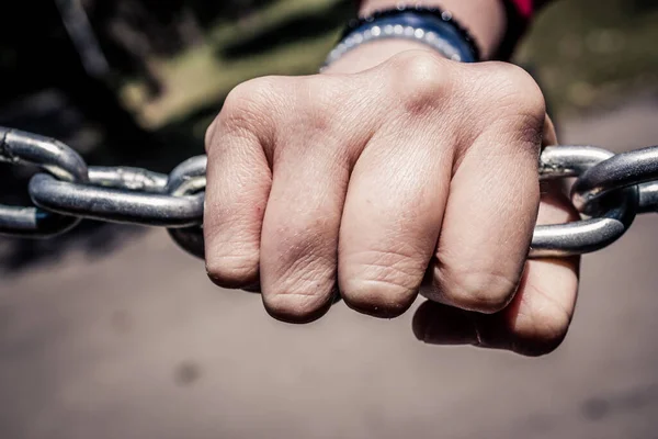 Young Hand Stainless Steel Chain Youth Issues Concept Conceptual Image — Stock Photo, Image