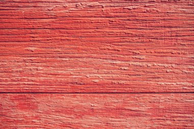 Yakın plan kırmızı kalasları doğal ışık ile boyadı.