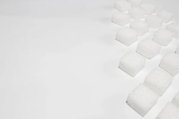Wenige Zuckerwürfel Auf Weißem Hintergrund Auf Der Rechten Seite Des — Stockfoto