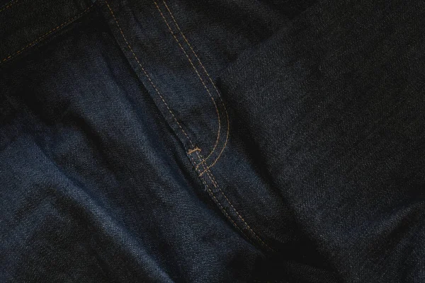 深蓝色牛仔裤背景 缝制精细 细斜纹斜纹棉织物 有拉链缝 — 图库照片