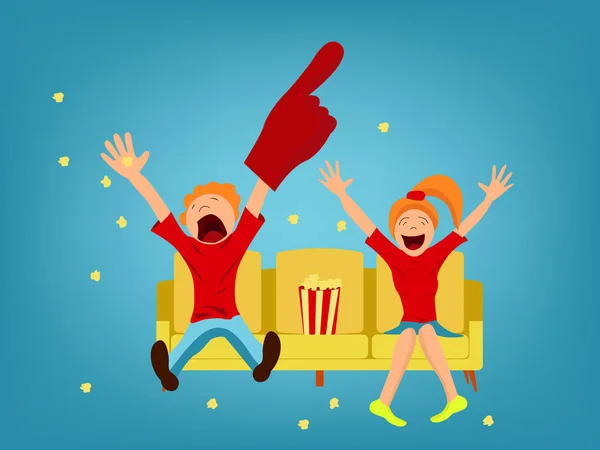 Sarı bir kanepe taraftarlara. Adam ve kız zafer ile mutluyuz.