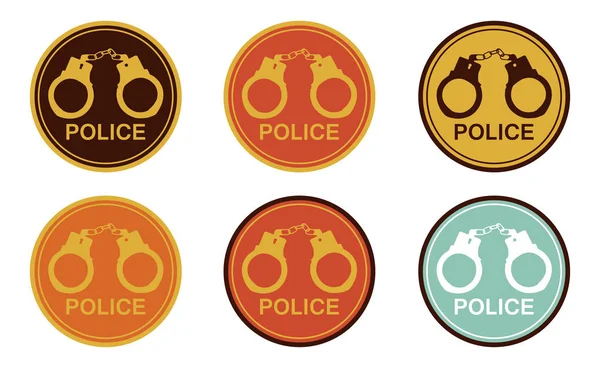 Polis çıkartmaları ile bir dizi retro tarzında kelepçe.