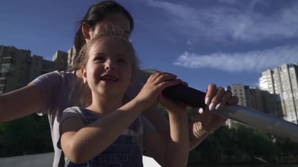 Mother and daughter rowing in the boat — Stock Video