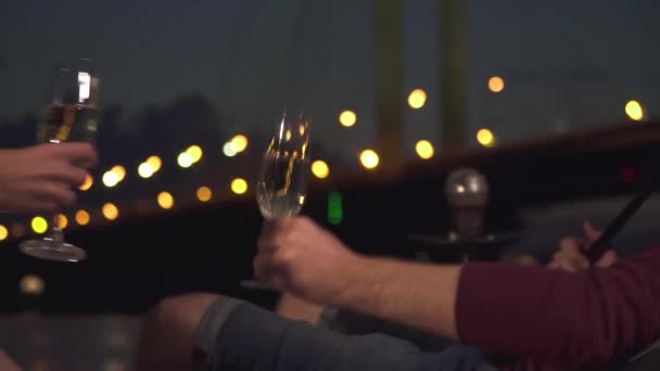 Clinking glasses with champagne — Stock Video