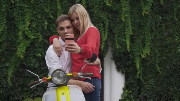 Beautiful Couple Makes Selfie Motorbike Guy Moped Hugs Girl Girl — Stock Video