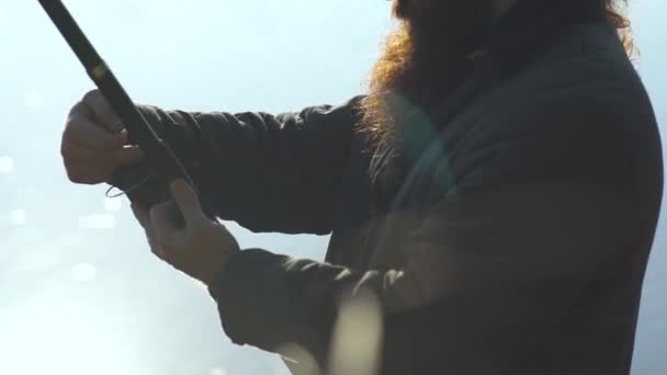 Fisherman Adjusts Fishing Rod Fishing Bearded Fisher Fishing — Stock Video