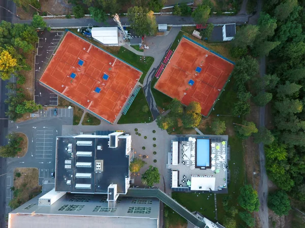 Aerial view tennis courts. Concept of recreation and leisure outdoors. Luxury resort.