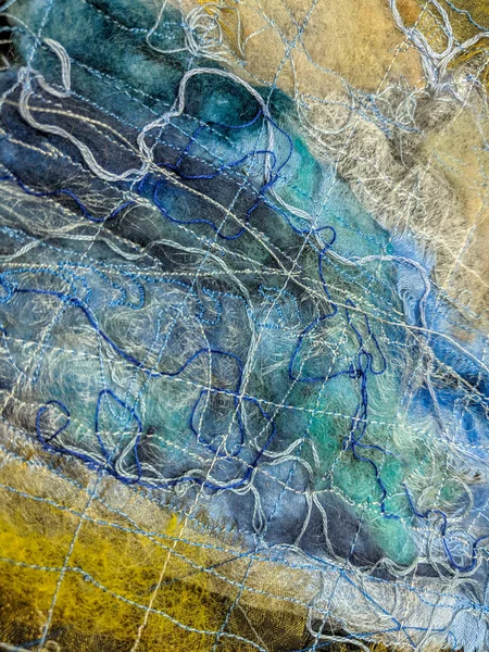 Handgjord blå och gul Textil konst bakgrund. Närbild. — Stockfoto
