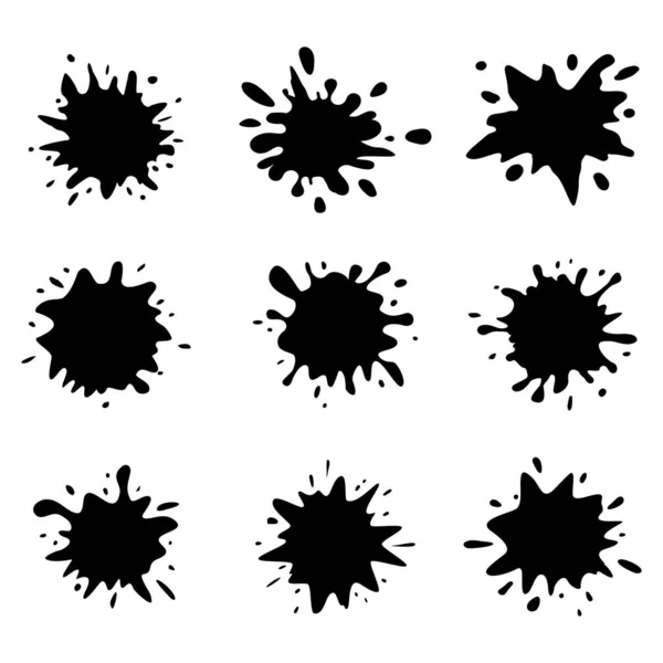 Taches d'encre noire sur fond blanc — Image vectorielle