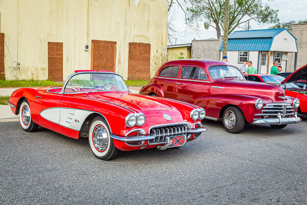 Jesup, GA - March 17, 2018: Close up view of a 1960 Chevrolet Corvette at the Jesup 2018 St. Patrick 's Day Car Show.