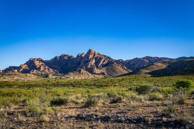 The Dragoon Mountains are a mountain range in Cochise County, Arizona near the historic town of Tombstone. clipart