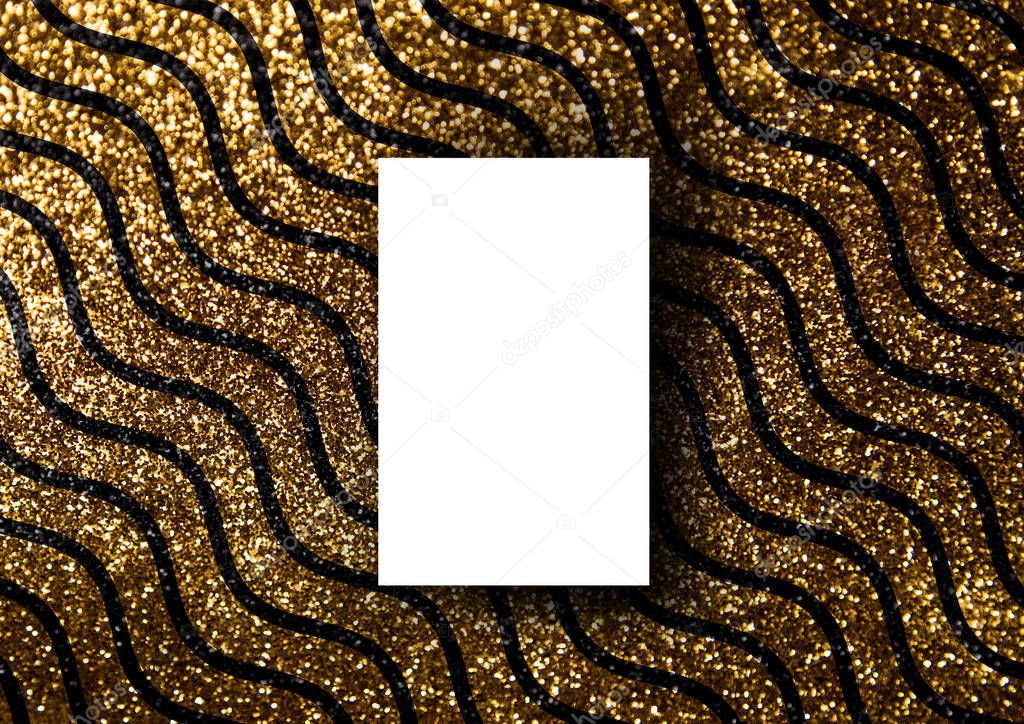 The business card mock-up template with gold glitter wavy line pattern fashion dark paper background