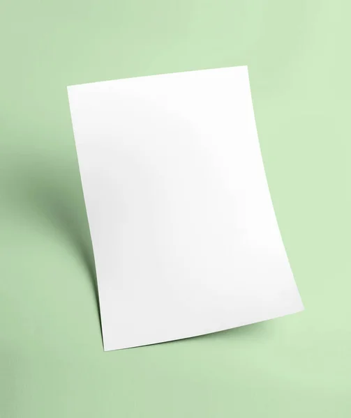 White blank document paper template with green background