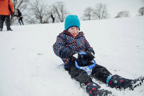 Little Boy Smiling Camera While Sliding Hill Sled — Stock Photo, Image